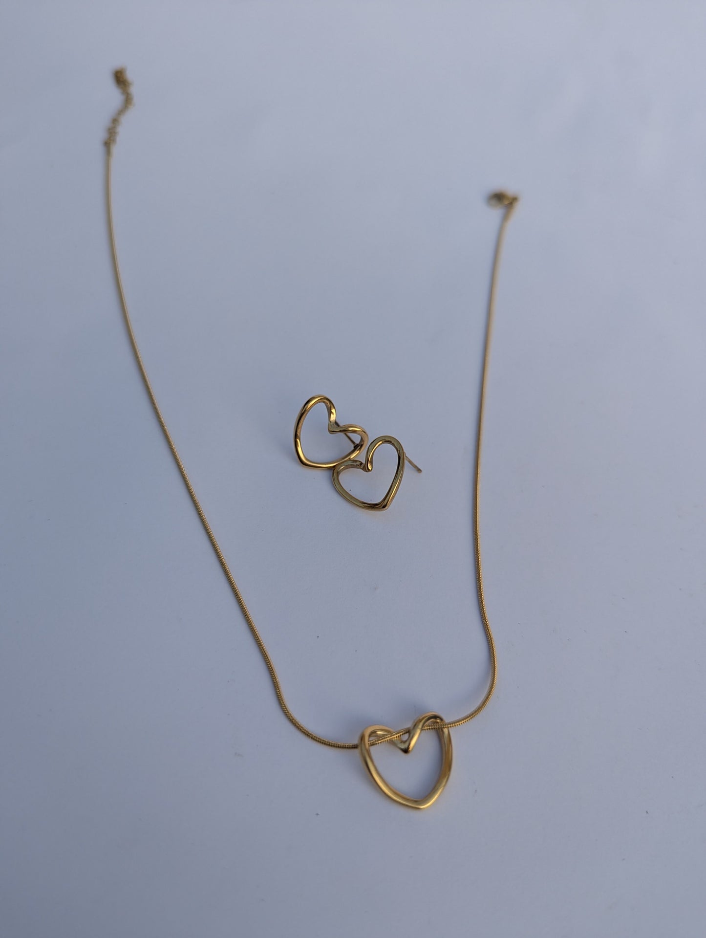 Golden Double Heart Pendant Necklace in gold tone