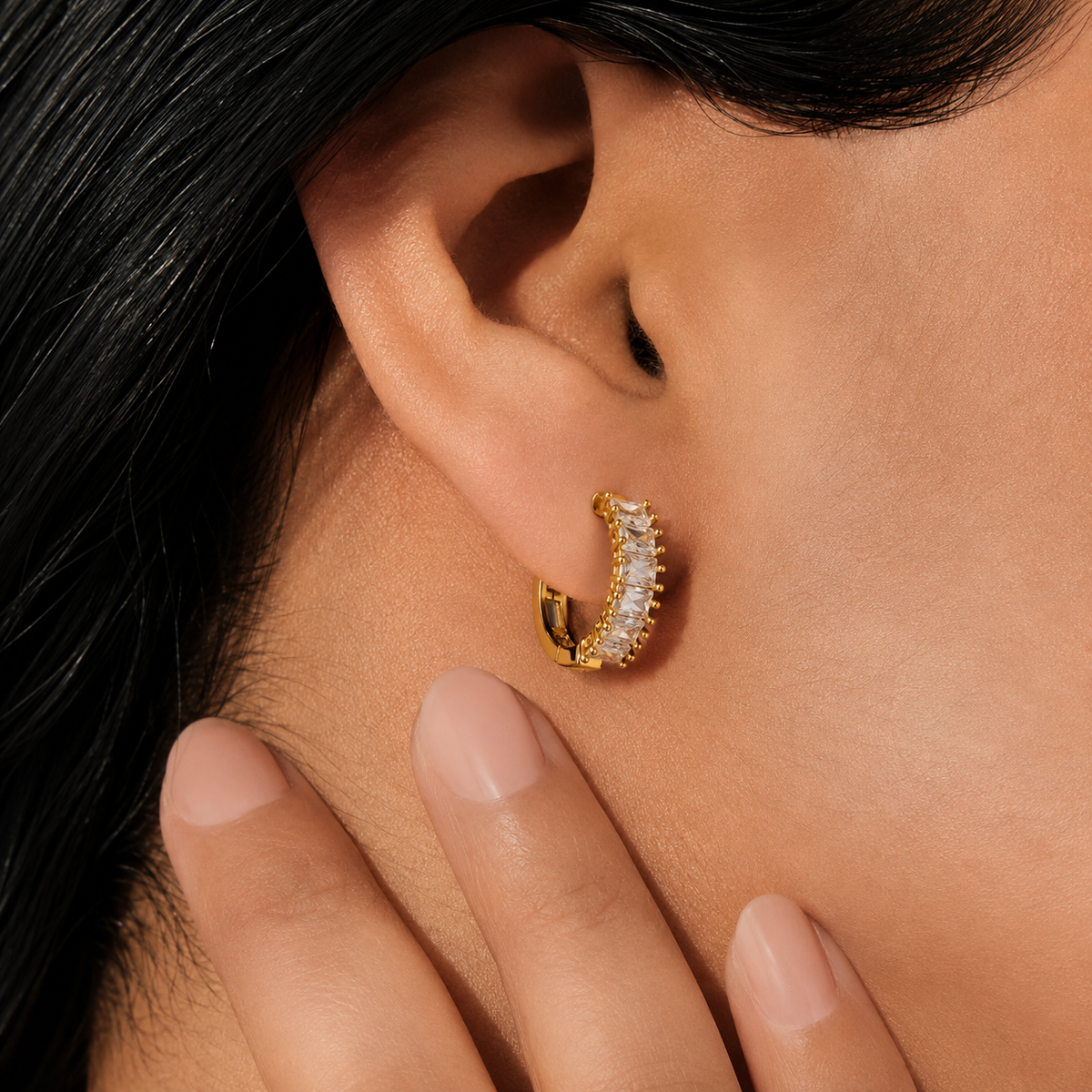 Golden Baguette Crystal Huggie Hoops worn on ear