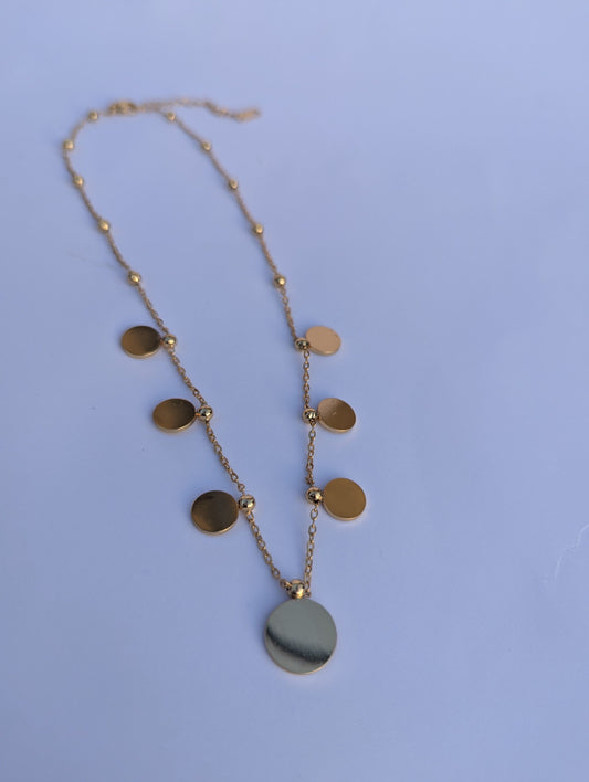 Golden Disc Cascade Pendant Necklace in gold tone
