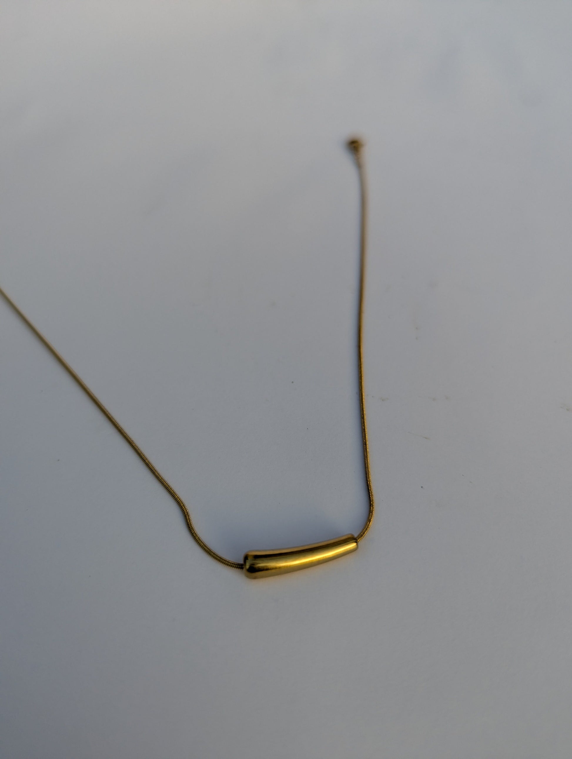 Minimal Golden Bar Pendant Necklace in gold tone