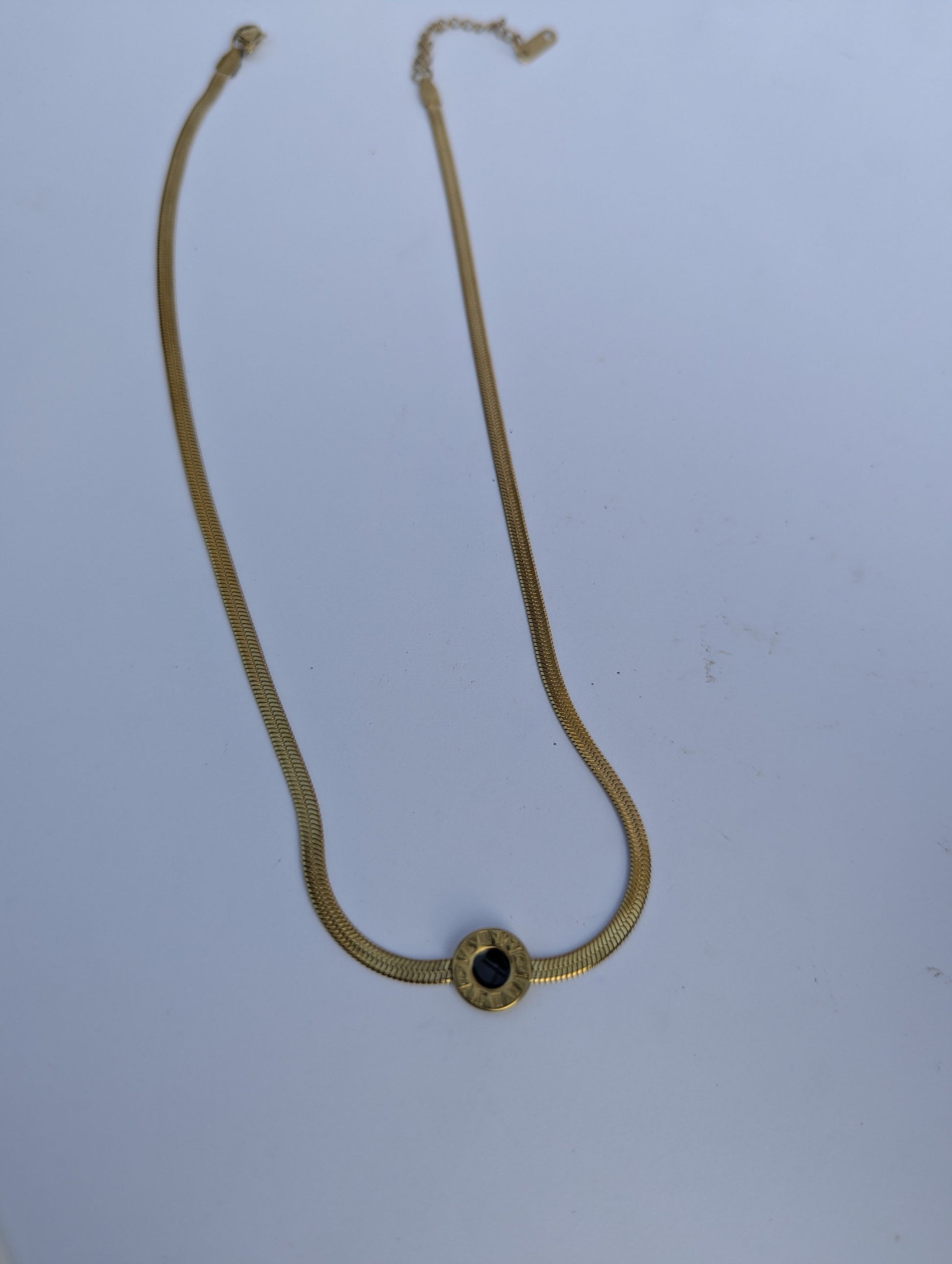 Golden Black Stone Circle Necklace in black and gold tone