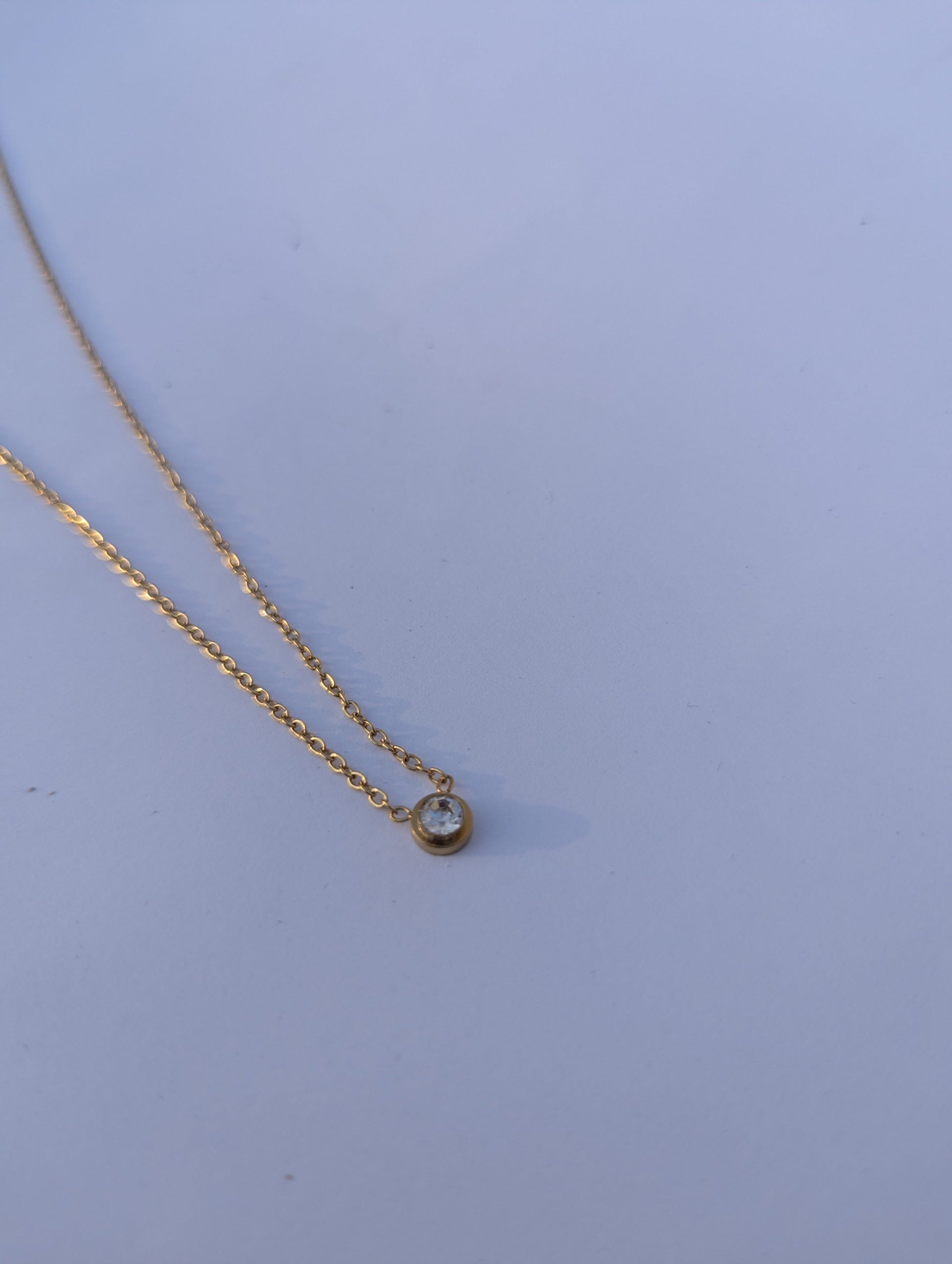 Delicate Golden Solitaire Pendant Necklace in gold tone